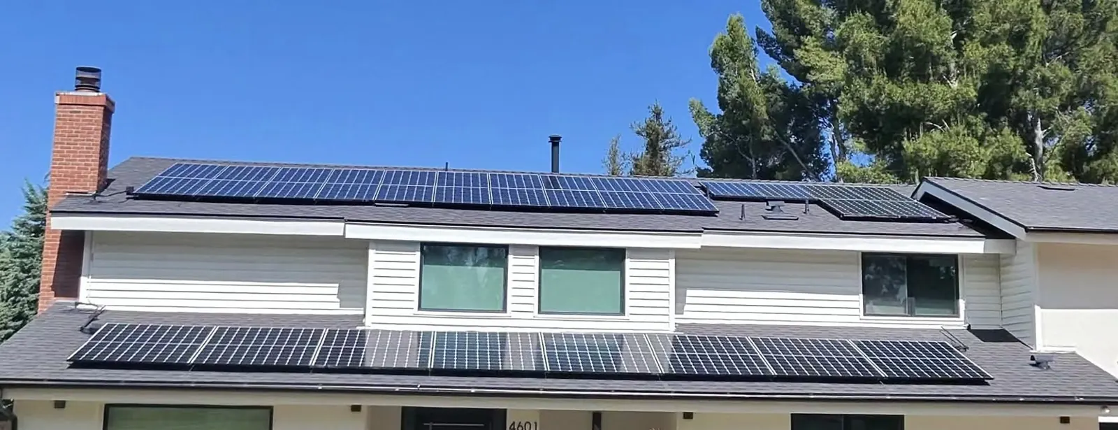 Home with a finished roof and solar panels